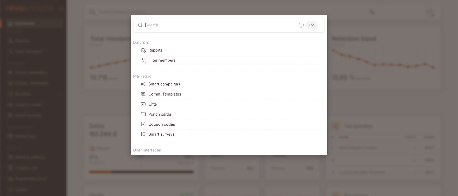 The quick-navigation palette overlay. Header reads "Search" with an Esc shortcut. Below: Data & BI section (Reports, Filter members), Marketing section (Smart campaigns, Comm. Templates, Gifts, Punch cards, Coupon codes, Smart surveys), User Interfaces section (cut off below the fold).