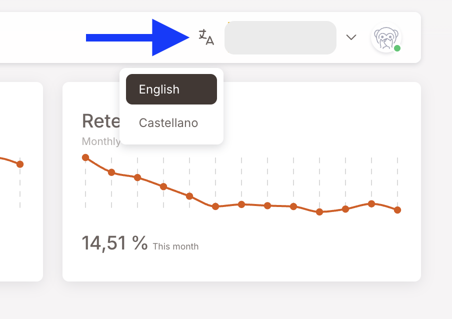 Das Dropdown des Sprachumschalters geöffnet neben dem Übersetzungssymbol. Zwei Optionen sichtbar: English (ausgewählt, hervorgehoben) und Castellano. Ein blauer Pfeil im Screenshot zeigt auf das Übersetzungssymbol, das das Dropdown öffnet.